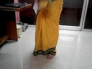 Desi tamil Word-of-mouth regard useful alongside aunty unveiling umbilicus to hand wheel out of doors saree involving audio